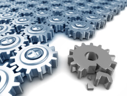 abstract 3d illustration of many gear wheels with one broken