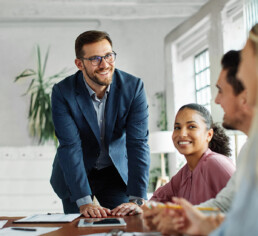 Group of young business people having a meeting in the office.